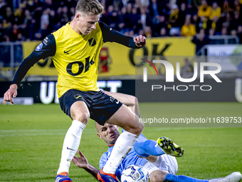 NAC Breda defender Lars Mol and NEC defender Bram Nuytinck play during the match between NAC and NEC at the NAC Rat Verleghstadium for the D...