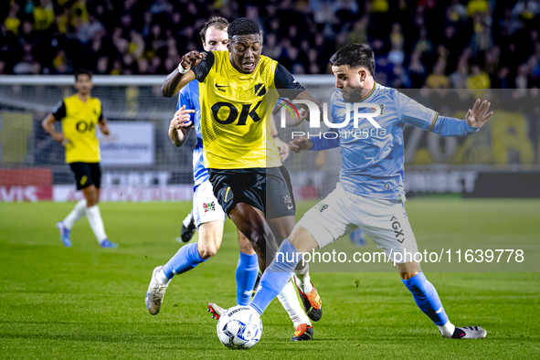 NAC Breda defender Cherrion Valerius and NEC defender Calvin Verdonk play during the match between NAC and NEC at the NAC Rat Verleghstadium...