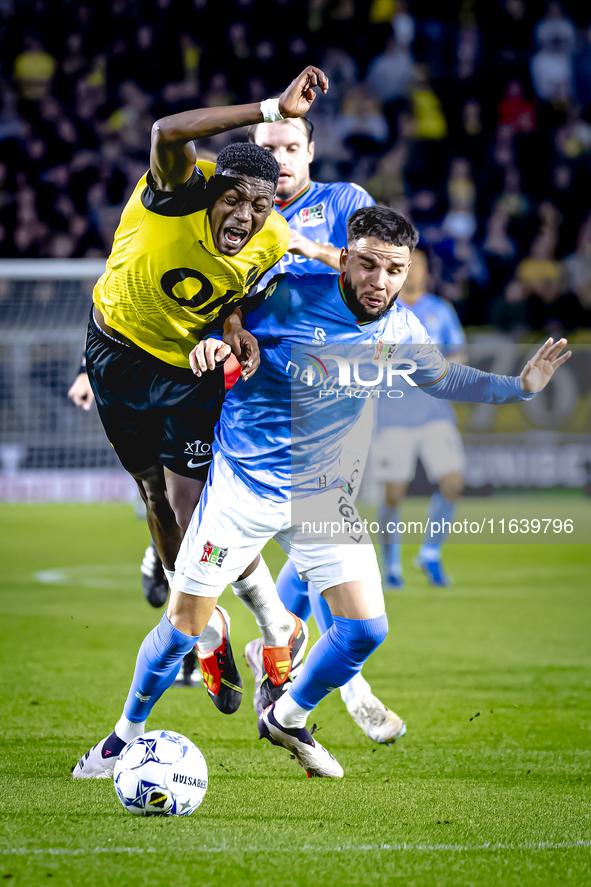 NAC Breda defender Cherrion Valerius and NEC defender Calvin Verdonk play during the match between NAC and NEC at the NAC Rat Verleghstadium...