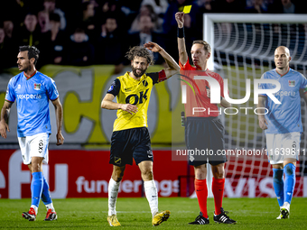 NAC Breda defender Jan van den Berg receives a yellow card from Referee Ingmar Oostrom during the match between NAC and NEC at the NAC Rat V...