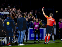 NAC Breda goalkeeping coach Gabor Babos receives a red card from referee Ingmar Oostrom during the match between NAC and NEC at the NAC Rat...