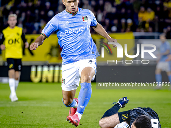 NEC forward Kento Shiogai and NAC Breda goalkeeper Daniel Bielica participate in the match between NAC and NEC at the NAC Rat Verleghstadium...