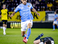 NEC forward Kento Shiogai and NAC Breda goalkeeper Daniel Bielica participate in the match between NAC and NEC at the NAC Rat Verleghstadium...