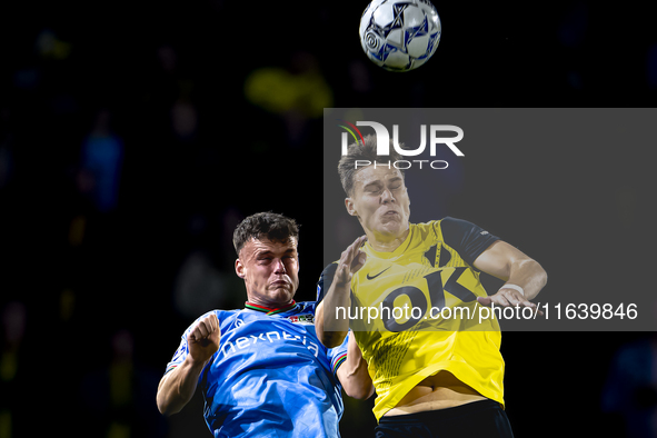 NAC Breda forward Kacper Kostorz faces NEC forward Vito van Crooij during the match between NAC and NEC at the NAC Rat Verleghstadium for th...