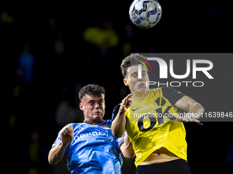 NAC Breda forward Kacper Kostorz faces NEC forward Vito van Crooij during the match between NAC and NEC at the NAC Rat Verleghstadium for th...