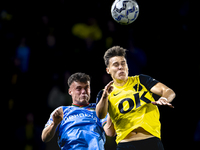 NAC Breda forward Kacper Kostorz faces NEC forward Vito van Crooij during the match between NAC and NEC at the NAC Rat Verleghstadium for th...