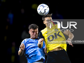 NAC Breda forward Kacper Kostorz faces NEC forward Vito van Crooij during the match between NAC and NEC at the NAC Rat Verleghstadium for th...