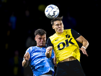 NAC Breda forward Kacper Kostorz faces NEC forward Vito van Crooij during the match between NAC and NEC at the NAC Rat Verleghstadium for th...