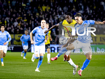 NAC Breda defender Terence Kongolo and NEC forward Kento Shiogai participate in the match between NAC and NEC at the NAC Rat Verleghstadium...