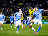 NAC Breda defender Terence Kongolo and NEC forward Kento Shiogai participate in the match between NAC and NEC at the NAC Rat Verleghstadium...