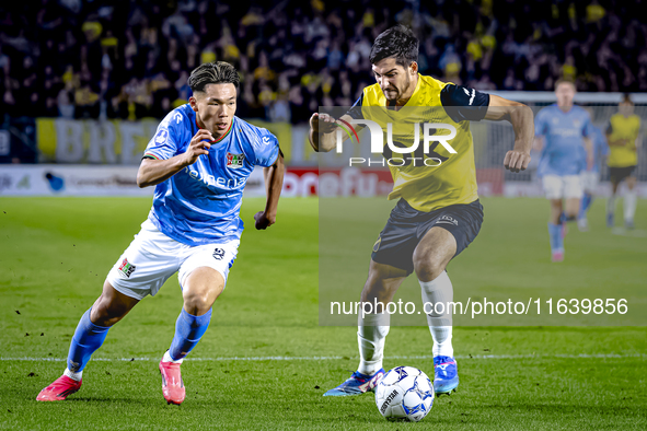 NEC forward Kento Shiogai and NAC Breda defender Leo Greiml play during the match between NAC and NEC at the NAC Rat Verlegh Stadium for the...