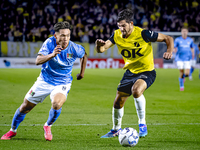 NEC forward Kento Shiogai and NAC Breda defender Leo Greiml play during the match between NAC and NEC at the NAC Rat Verlegh Stadium for the...