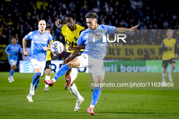 NAC Breda defender Terence Kongolo and NEC forward Kento Shiogai participate in the match between NAC and NEC at the NAC Rat Verleghstadium...