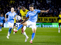 NAC Breda defender Terence Kongolo and NEC forward Kento Shiogai participate in the match between NAC and NEC at the NAC Rat Verleghstadium...