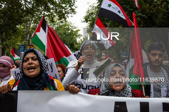 About 30,000 people with Palestinian and Lebanese flags walk the streets of Madrid, Spain, on October 5, 2024, to protest Israel's attacks o...