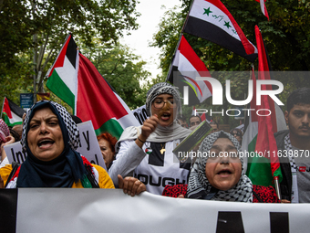 About 30,000 people with Palestinian and Lebanese flags walk the streets of Madrid, Spain, on October 5, 2024, to protest Israel's attacks o...