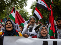 About 30,000 people with Palestinian and Lebanese flags walk the streets of Madrid, Spain, on October 5, 2024, to protest Israel's attacks o...