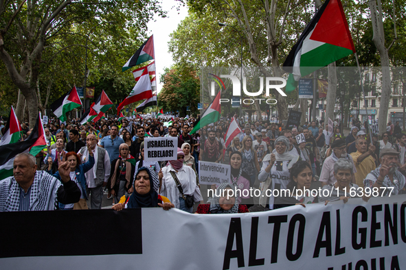 About 30,000 people with Palestinian and Lebanese flags walk the streets of Madrid, Spain, on October 5, 2024, to protest Israel's attacks o...