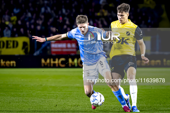 NEC midfielder Mees Hoedemakers and NAC Breda forward Kacper Kostorz play during the match between NAC and NEC at the NAC Rat Verlegh Stadiu...