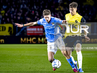 NEC midfielder Mees Hoedemakers and NAC Breda forward Kacper Kostorz play during the match between NAC and NEC at the NAC Rat Verlegh Stadiu...