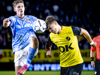 NEC midfielder Mees Hoedemakers and NAC Breda forward Kacper Kostorz play during the match between NAC and NEC at the NAC Rat Verlegh Stadiu...