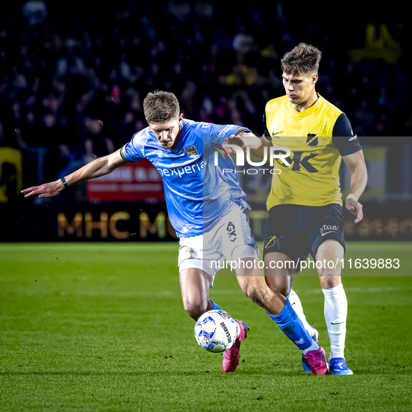 NEC midfielder Mees Hoedemakers and NAC Breda forward Kacper Kostorz play during the match between NAC and NEC at the NAC Rat Verlegh Stadiu...