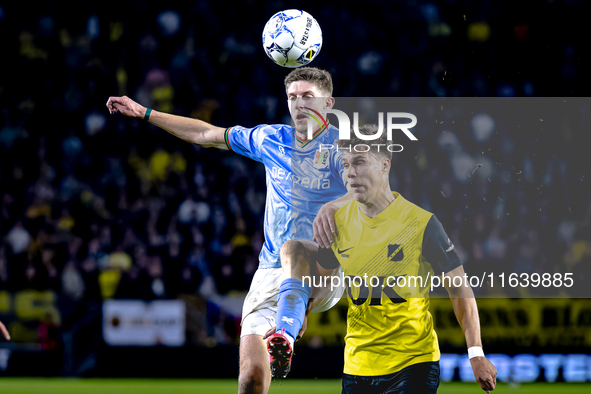 NEC midfielder Mees Hoedemakers and NAC Breda forward Kacper Kostorz play during the match between NAC and NEC at the NAC Rat Verlegh Stadiu...