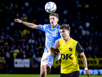 NEC midfielder Mees Hoedemakers and NAC Breda forward Kacper Kostorz play during the match between NAC and NEC at the NAC Rat Verlegh Stadiu...