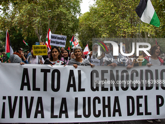 About 30,000 people with Palestinian and Lebanese flags walk the streets of Madrid, Spain, on October 5, 2024, to protest Israel's attacks o...