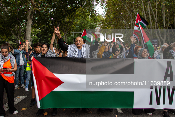 About 30,000 people with Palestinian and Lebanese flags walk the streets of Madrid, Spain, on October 5, 2024, to protest Israel's attacks o...