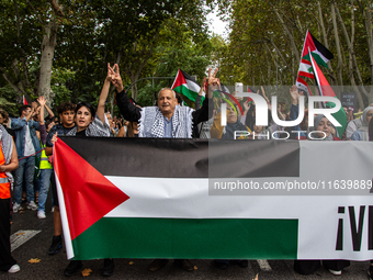 About 30,000 people with Palestinian and Lebanese flags walk the streets of Madrid, Spain, on October 5, 2024, to protest Israel's attacks o...