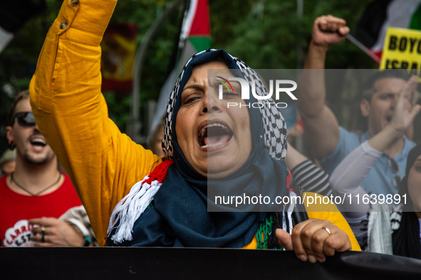 About 30,000 people with Palestinian and Lebanese flags walk the streets of Madrid, Spain, on October 5, 2024, to protest Israel's attacks o...