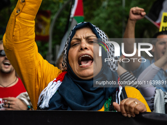 About 30,000 people with Palestinian and Lebanese flags walk the streets of Madrid, Spain, on October 5, 2024, to protest Israel's attacks o...