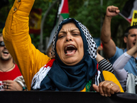 About 30,000 people with Palestinian and Lebanese flags walk the streets of Madrid, Spain, on October 5, 2024, to protest Israel's attacks o...