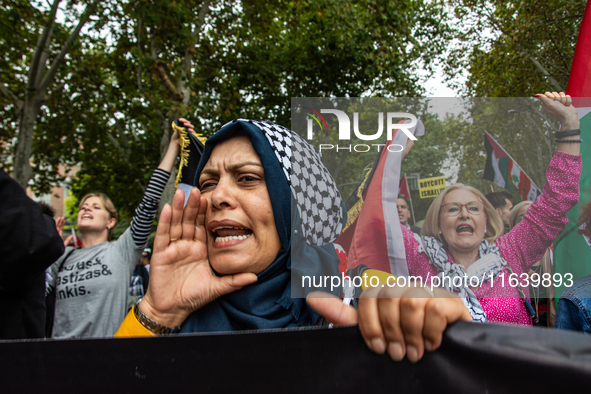 About 30,000 people with Palestinian and Lebanese flags walk the streets of Madrid, Spain, on October 5, 2024, to protest Israel's attacks o...