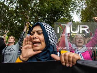 About 30,000 people with Palestinian and Lebanese flags walk the streets of Madrid, Spain, on October 5, 2024, to protest Israel's attacks o...