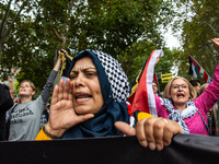 About 30,000 people with Palestinian and Lebanese flags walk the streets of Madrid, Spain, on October 5, 2024, to protest Israel's attacks o...