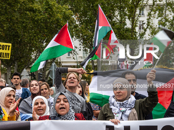 About 30,000 people with Palestinian and Lebanese flags walk the streets of Madrid, Spain, on October 5, 2024, to protest Israel's attacks o...