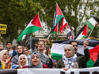 About 30,000 people with Palestinian and Lebanese flags walk the streets of Madrid, Spain, on October 5, 2024, to protest Israel's attacks o...