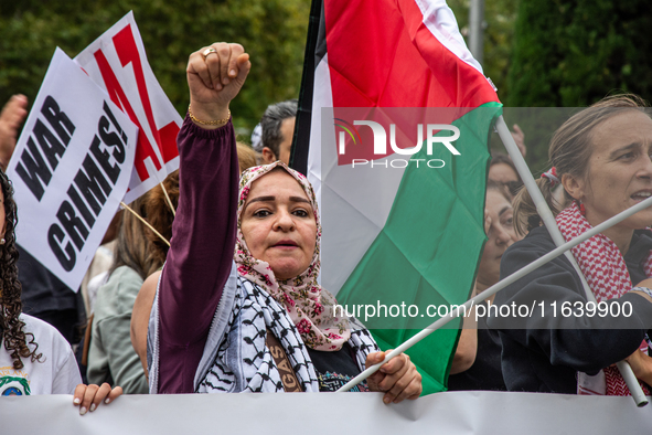 About 30,000 people with Palestinian and Lebanese flags walk the streets of Madrid, Spain, on October 5, 2024, to protest Israel's attacks o...