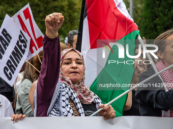 About 30,000 people with Palestinian and Lebanese flags walk the streets of Madrid, Spain, on October 5, 2024, to protest Israel's attacks o...