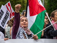 About 30,000 people with Palestinian and Lebanese flags walk the streets of Madrid, Spain, on October 5, 2024, to protest Israel's attacks o...