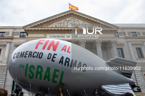 About 30,000 people with Palestinian and Lebanese flags walk the streets of Madrid, Spain, on October 5, 2024, to protest Israel's attacks o...