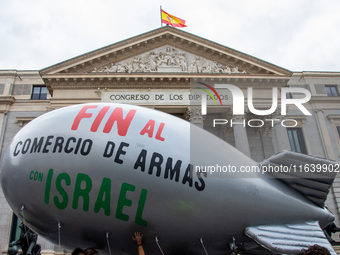 About 30,000 people with Palestinian and Lebanese flags walk the streets of Madrid, Spain, on October 5, 2024, to protest Israel's attacks o...