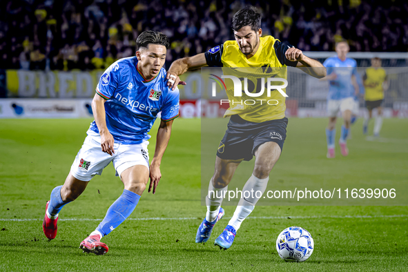 NEC forward Kento Shiogai and NAC Breda defender Leo Greiml play during the match between NAC and NEC at the NAC Rat Verlegh Stadium for the...