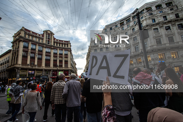 About 30,000 people with Palestinian and Lebanese flags walk the streets of Madrid, Spain, on October 5, 2024, to protest Israel's attacks o...