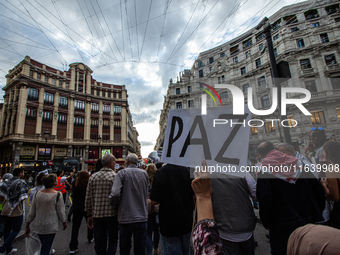 About 30,000 people with Palestinian and Lebanese flags walk the streets of Madrid, Spain, on October 5, 2024, to protest Israel's attacks o...