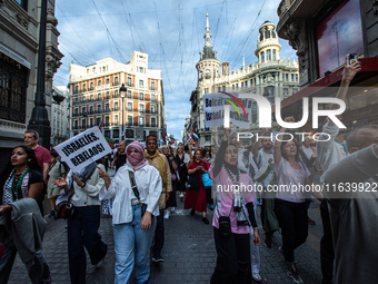 About 30,000 people with Palestinian and Lebanese flags walk the streets of Madrid, Spain, on October 5, 2024, to protest Israel's attacks o...