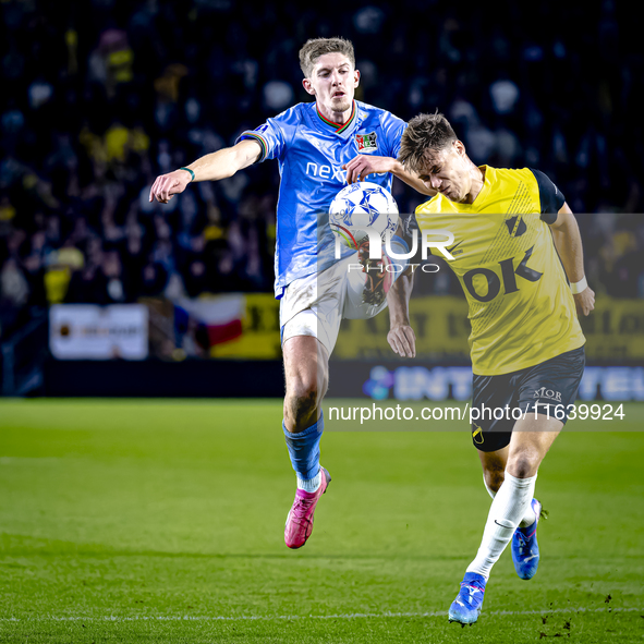 NEC midfielder Mees Hoedemakers and NAC Breda forward Kacper Kostorz play during the match between NAC and NEC at the NAC Rat Verlegh Stadiu...