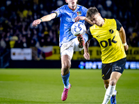 NEC midfielder Mees Hoedemakers and NAC Breda forward Kacper Kostorz play during the match between NAC and NEC at the NAC Rat Verlegh Stadiu...